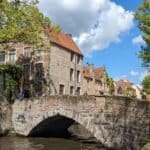 a stone bridge over a river