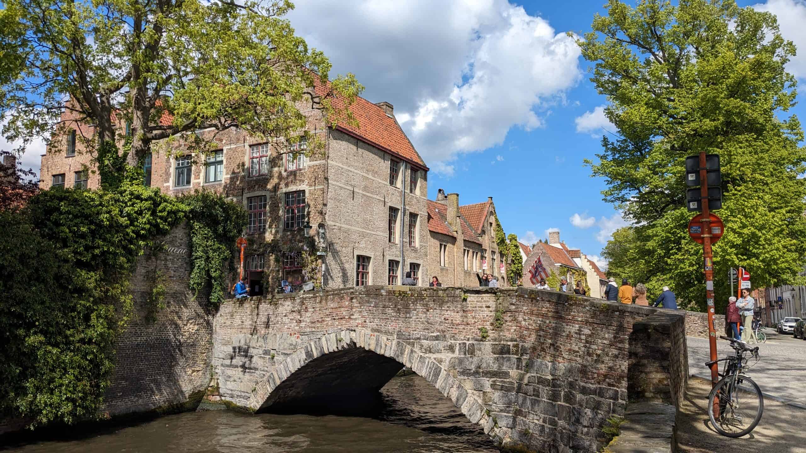 a stone bridge over a river