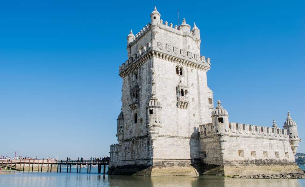 Picturesque Lisbon, Portugal — Belém Tower, a UNESCO World Heritage site on the riverbank, showcasing iconic Manueline architecture and historical maritime significance.